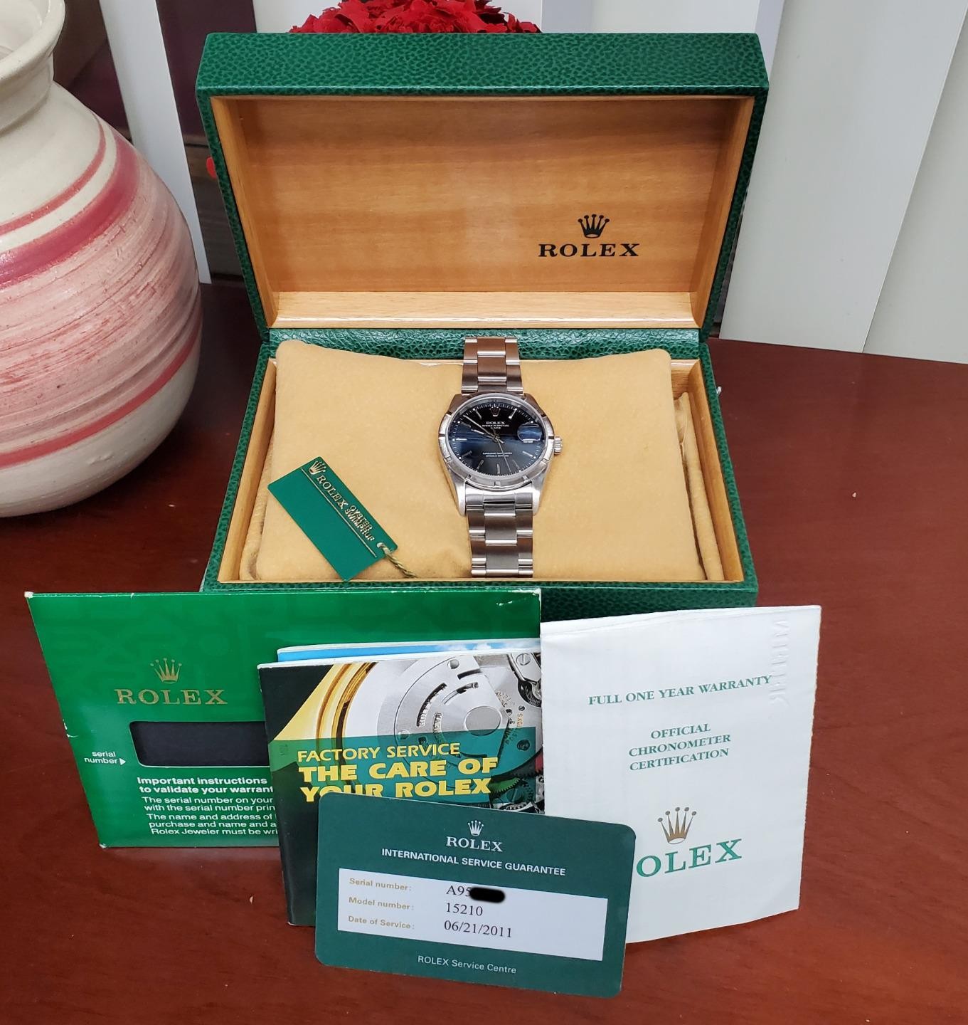 Rolex Date 34mm 15210 Steel Engine Turn Bezel Blue Dial 2000 Boxes Papers